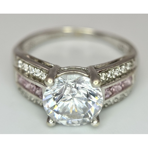 164 - A 9K White Gold Fancy White Zircon Ring. Size M. 3.3g