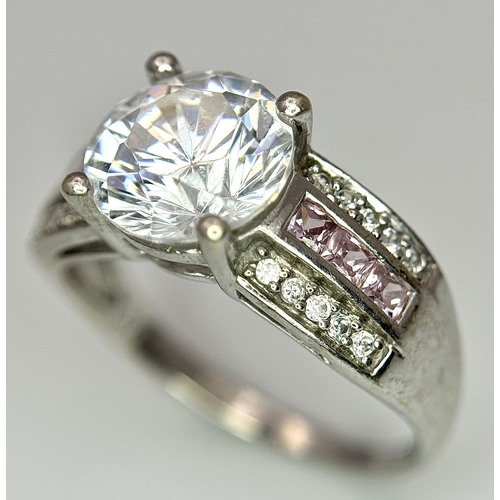 164 - A 9K White Gold Fancy White Zircon Ring. Size M. 3.3g