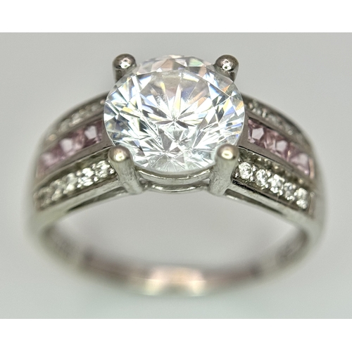 164 - A 9K White Gold Fancy White Zircon Ring. Size M. 3.3g