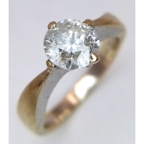 185 - An 18K Yellow Gold Diamond Solitaire Ring. 1ct. 1  setting claw missing so as found. size M 1/2. 5.3... 