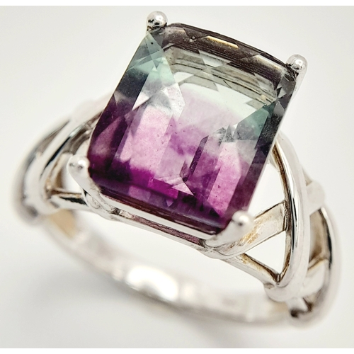 879 - An Unique Sterling Silver Celtic Design Flourite Set Love Ring Size P. The ring is set with a 1.2cm ... 