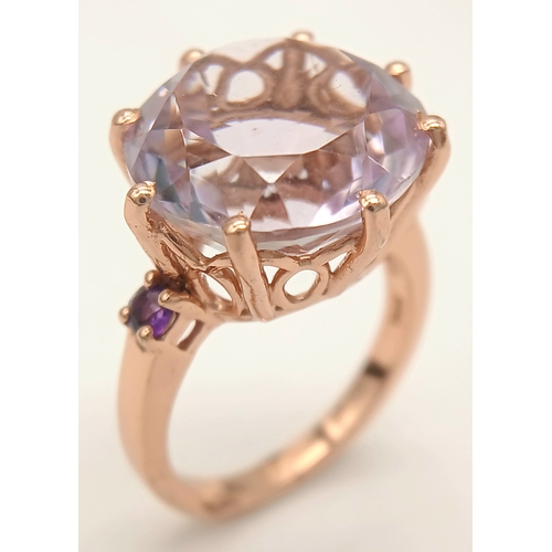 900 - An Exquisite Rose Gold Gilt Sterling Silver and Amethyst Solitaire Ring Size N1/2. The Ring is set w... 