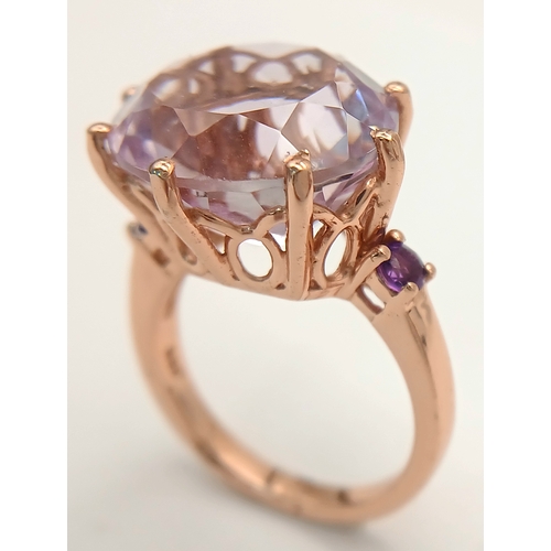 900 - An Exquisite Rose Gold Gilt Sterling Silver and Amethyst Solitaire Ring Size N1/2. The Ring is set w... 