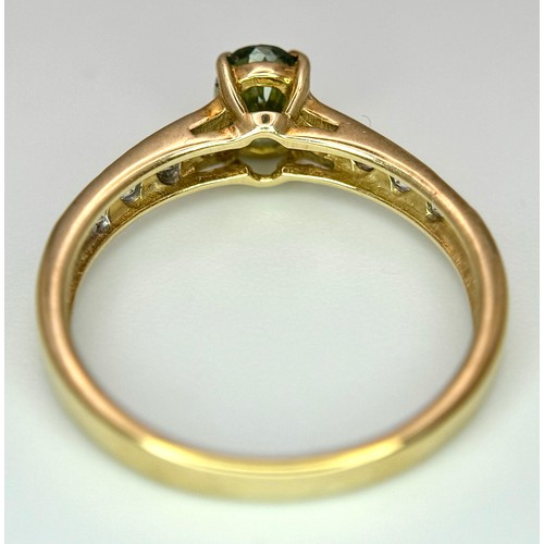 7 - Beautiful 9 CARAT GOLD and PERIDOT RING. Nicely set,having an oval cut PERIDOT mounted to top with W... 