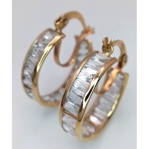 63 - Classic pair of 9 CARAT GOLD HOOP EARRINGS. Set with Emerald Cut Zirconia Gemstones. Full UK Hallmar... 