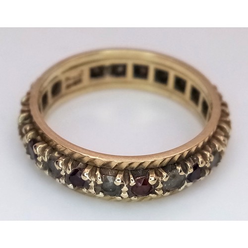 84 - Fabulous 9 CARAT GOLD BAND RING set with a full circle of Red and White gemstones. Full UK hallmark.... 