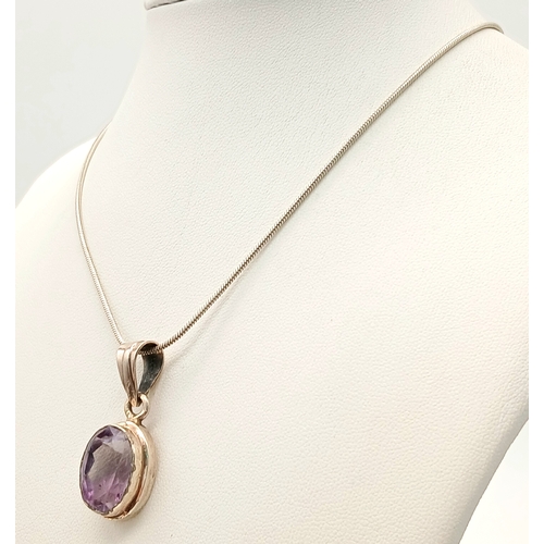 1288 - A Vintage Sterling Silver Oval Cut Amethyst Pendant Necklace-46cm Length Rope Chain. The Pendant is ... 