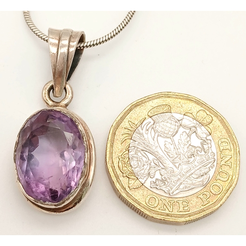 1288 - A Vintage Sterling Silver Oval Cut Amethyst Pendant Necklace-46cm Length Rope Chain. The Pendant is ... 