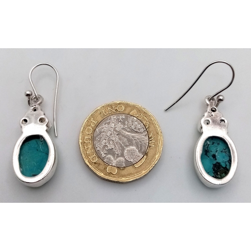 1302 - A Stylish Pair of Sterling Silver Turquoise Set Earrings. 3.2cm Drop. Earrings measure 1.2cm Wide.