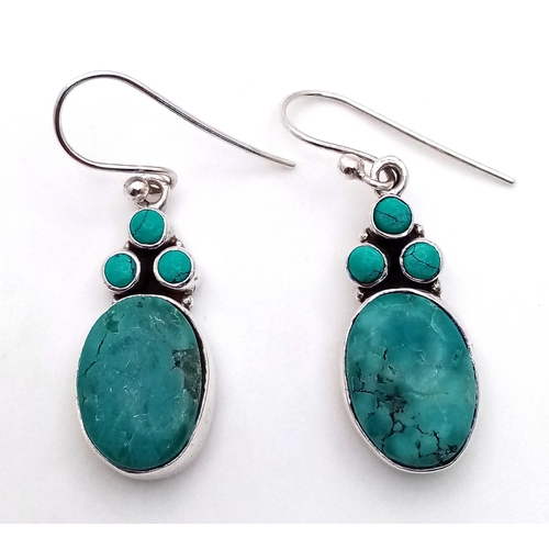 1302 - A Stylish Pair of Sterling Silver Turquoise Set Earrings. 3.2cm Drop. Earrings measure 1.2cm Wide.