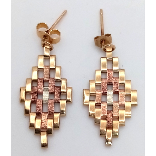 77 - Impressive pair of  9 CARAT GOLD DROP EARRINGS. Drop Style finished in BRICKWORK TWO COLOUR  GOLD. C... 