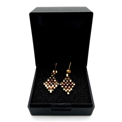 77 - Impressive pair of  9 CARAT GOLD DROP EARRINGS. Drop Style finished in BRICKWORK TWO COLOUR  GOLD. C... 