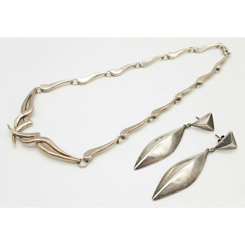 1409 - A Solid Silver 925 Collar Necklace and A Pair of Earrings, Total weight: 44.3 grams, 43cm. In very g... 