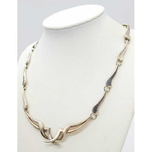 1409 - A Solid Silver 925 Collar Necklace and A Pair of Earrings, Total weight: 44.3 grams, 43cm. In very g... 