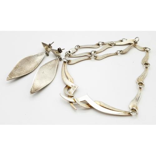 1409 - A Solid Silver 925 Collar Necklace and A Pair of Earrings, Total weight: 44.3 grams, 43cm. In very g... 