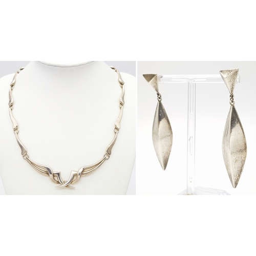 1409 - A Solid Silver 925 Collar Necklace and A Pair of Earrings, Total weight: 44.3 grams, 43cm. In very g... 