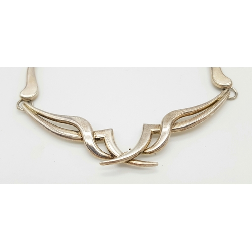 1409 - A Solid Silver 925 Collar Necklace and A Pair of Earrings, Total weight: 44.3 grams, 43cm. In very g... 