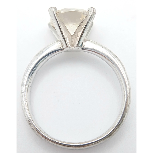 1296 - A Silver Large White Stone Dress Ring.