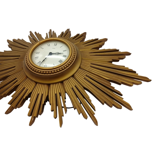 1630 - A Vintage Metamec Retro Sun Burst Wall Clock. Needs to be connected to an electrical supply so as fo... 