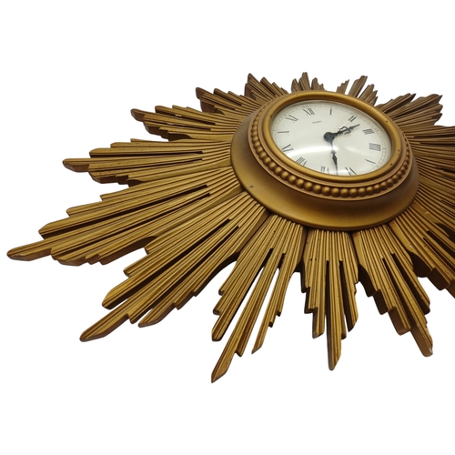 1630 - A Vintage Metamec Retro Sun Burst Wall Clock. Needs to be connected to an electrical supply so as fo... 