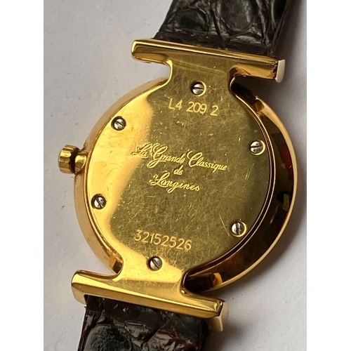 42 - Ladies  LONGINES LE GRANDE CLASSIQUE WRISTWATCH. Gold Plated . Black crocodile strap. Quartz Movemen... 