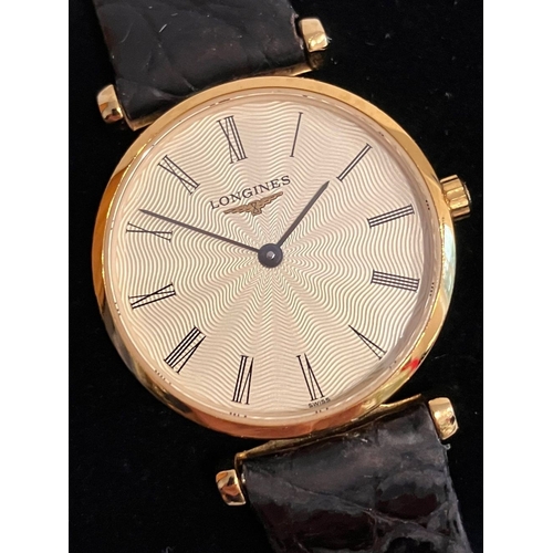 42 - Ladies  LONGINES LE GRANDE CLASSIQUE WRISTWATCH. Gold Plated . Black crocodile strap. Quartz Movemen... 