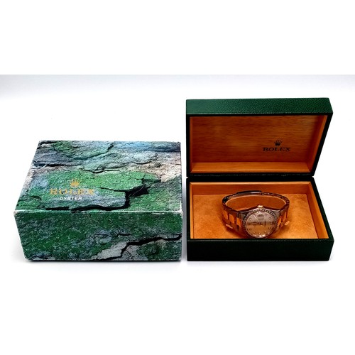 249 - A Bi-Metal Rolex Diamond Datejust Gents Watch. 2003 model. 18k gold and stainless steel bracelet. St... 