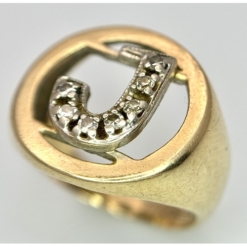 862 - A 9K Yellow Gold (tested), Initial 'J' Signet Ring. White stone decoration. Size G. 4g.