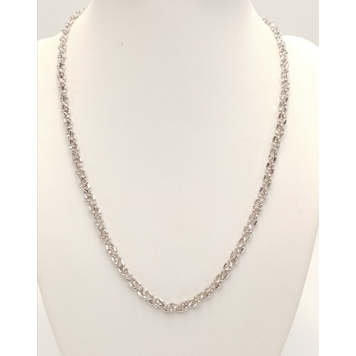 869 - A 9K White Gold Intricate Link Necklace. 42cm. 10.6g