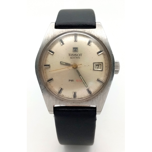 877 - A Vintage Tissot PR 516 Automatic Gents Watch. Black leather strap. Stainless steel case - 35mm. Sil... 