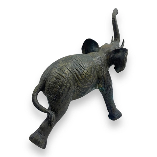 1304 - An antique Pair of Bronze Asian Elephant Sculptures. Patinated bronze exterior with intricate detail... 