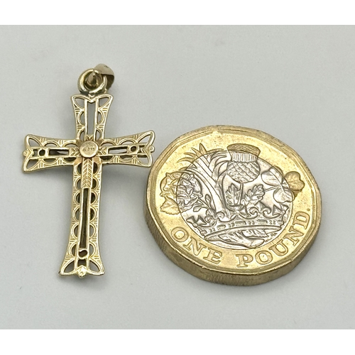 1299 - A 9K White and Yellow Gold Crucifix Pendant. 4cm. 1.4g. Ref: 620851