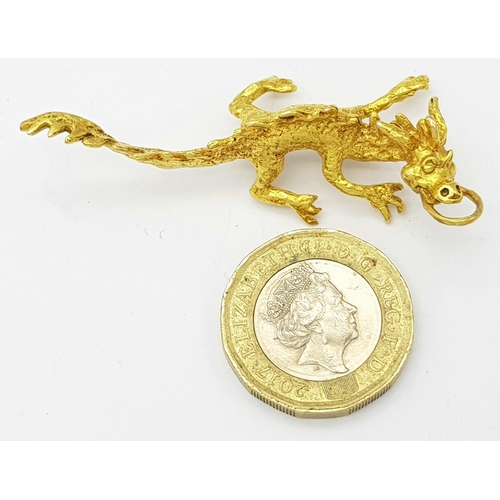 1313 - A 9K Yellow Gold Dragon Figure Pendant. 6cm. 6.08g. Ref: 6117801