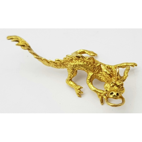 1313 - A 9K Yellow Gold Dragon Figure Pendant. 6cm. 6.08g. Ref: 6117801