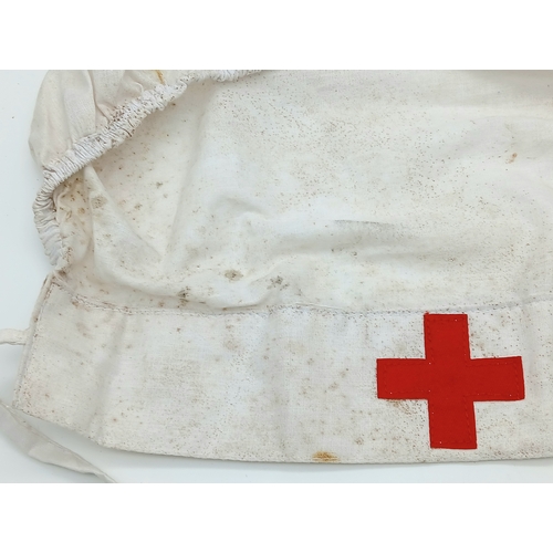 888 - An Original WWII German Red Cross DRK Helferin Nurse's head cover. Unissued War stock from a box tha... 