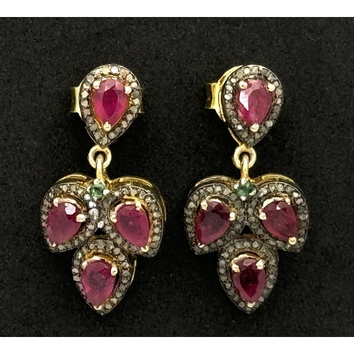 1247 - A Pair of 925 Silver Ruby and Diamond Earrings, in a three teardrop-shaped design. Featuring approxi... 