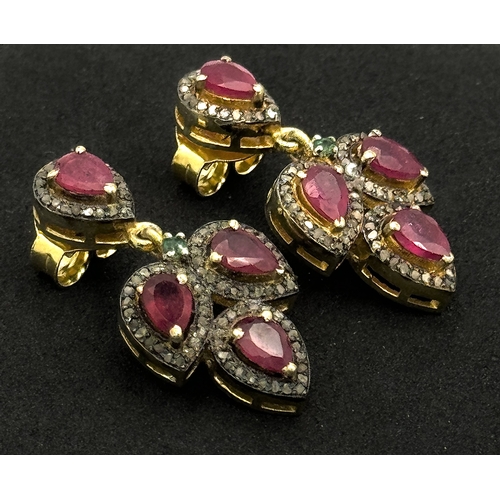 1247 - A Pair of 925 Silver Ruby and Diamond Earrings, in a three teardrop-shaped design. Featuring approxi... 