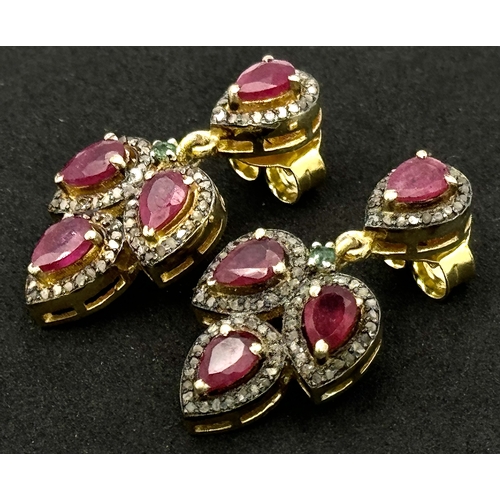 1247 - A Pair of 925 Silver Ruby and Diamond Earrings, in a three teardrop-shaped design. Featuring approxi... 