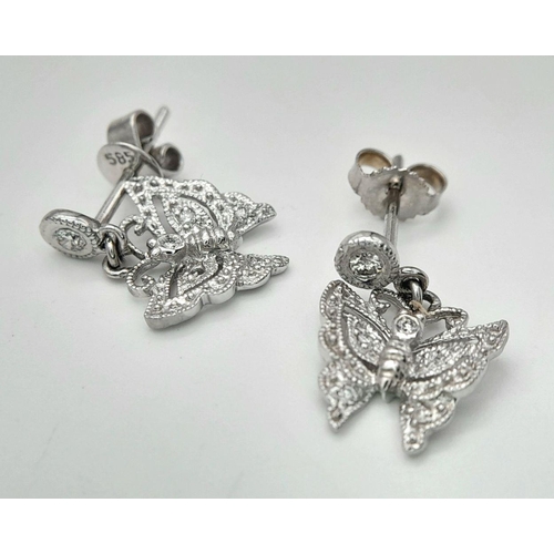 434 - A Pair of Vintage 14K White Gold and Diamond Earrings in Butterfly Form. 2.2g