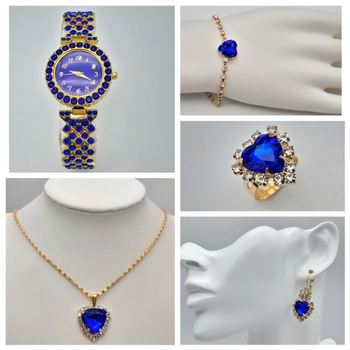 160 - A parure set consisting of a watch, necklace, earrings, bracelet and ring in a miniature, portable j... 