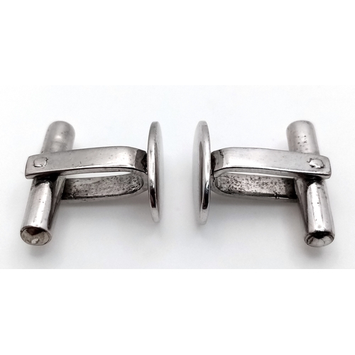 26 - A Pair of 18K White Gold Oval Cufflinks. 9.27g