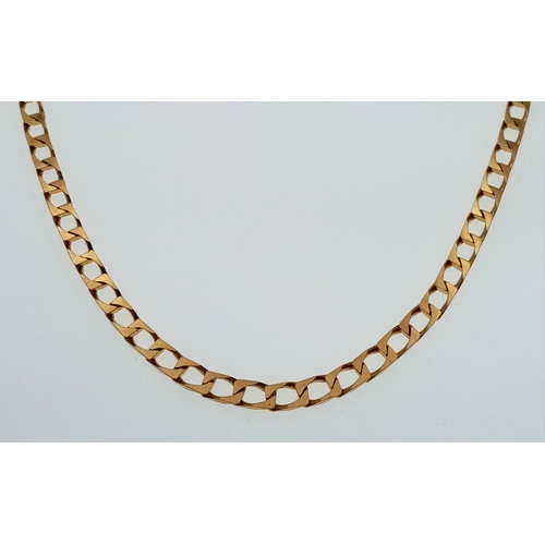 3 - A 9K Yellow Gold Flat Curb Link Chain. Good condition. 60cm. 27g.