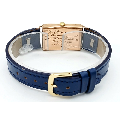 85 - A Charming Vintage (mid 1930s) Gold Cased Watch. Blue leather strap. White dial with second sub dial... 