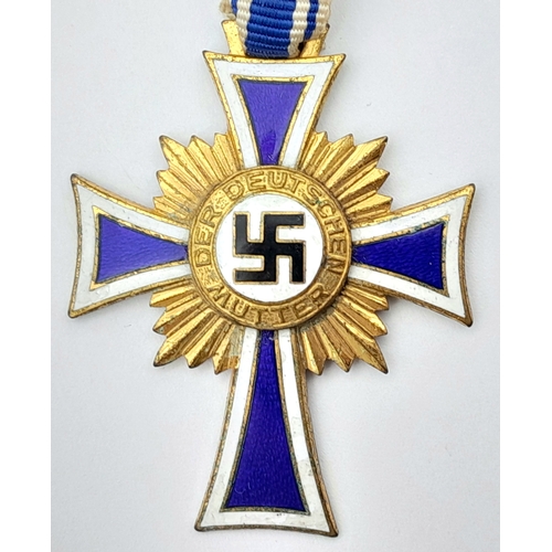 146 - A Third Reich Cross of Honour of the German Mother. Gold Class. Awarded in 1938. Original box. With ... 