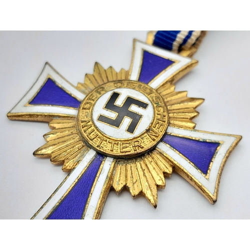 146 - A Third Reich Cross of Honour of the German Mother. Gold Class. Awarded in 1938. Original box. With ... 