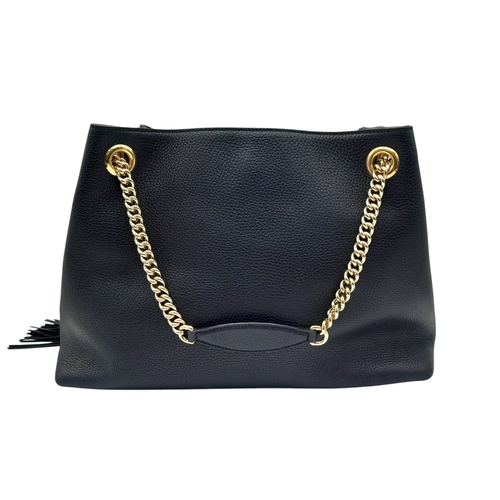 277 - A Gucci Black Soho Leather Shoulder Bag. Black pebbled leather exterior with gold-toned hardware, ch... 