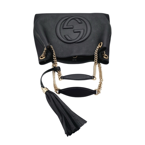 277 - A Gucci Black Soho Leather Shoulder Bag. Black pebbled leather exterior with gold-toned hardware, ch... 