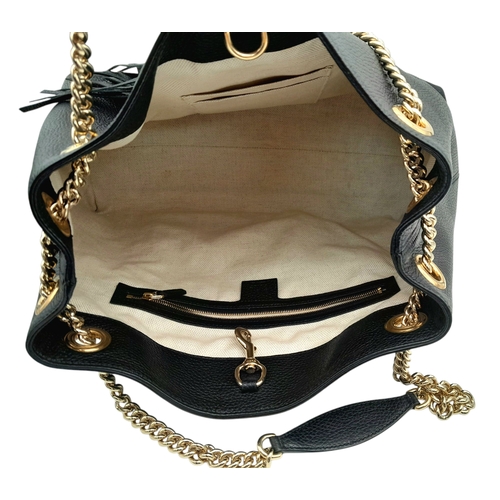 277 - A Gucci Black Soho Leather Shoulder Bag. Black pebbled leather exterior with gold-toned hardware, ch... 