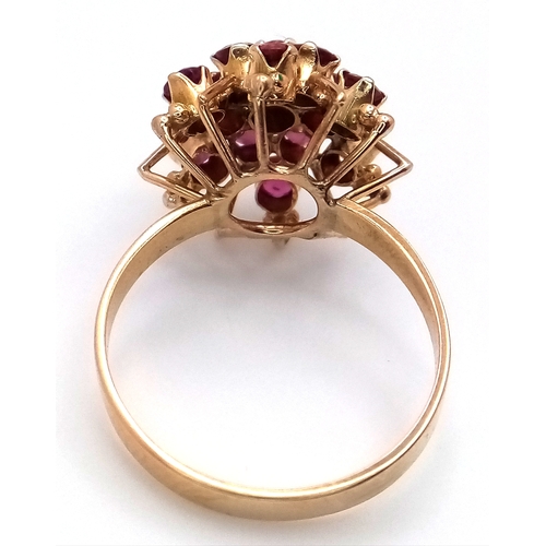 299 - A 14K YELLOW GOLD RUBY SET RING 3.3G TOTAL WEIGHT, SIZE O. Ref: SC 4032