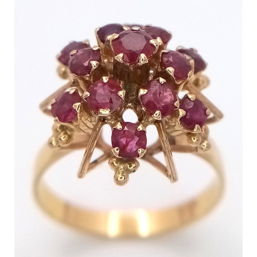 299 - A 14K YELLOW GOLD RUBY SET RING 3.3G TOTAL WEIGHT, SIZE O. Ref: SC 4032